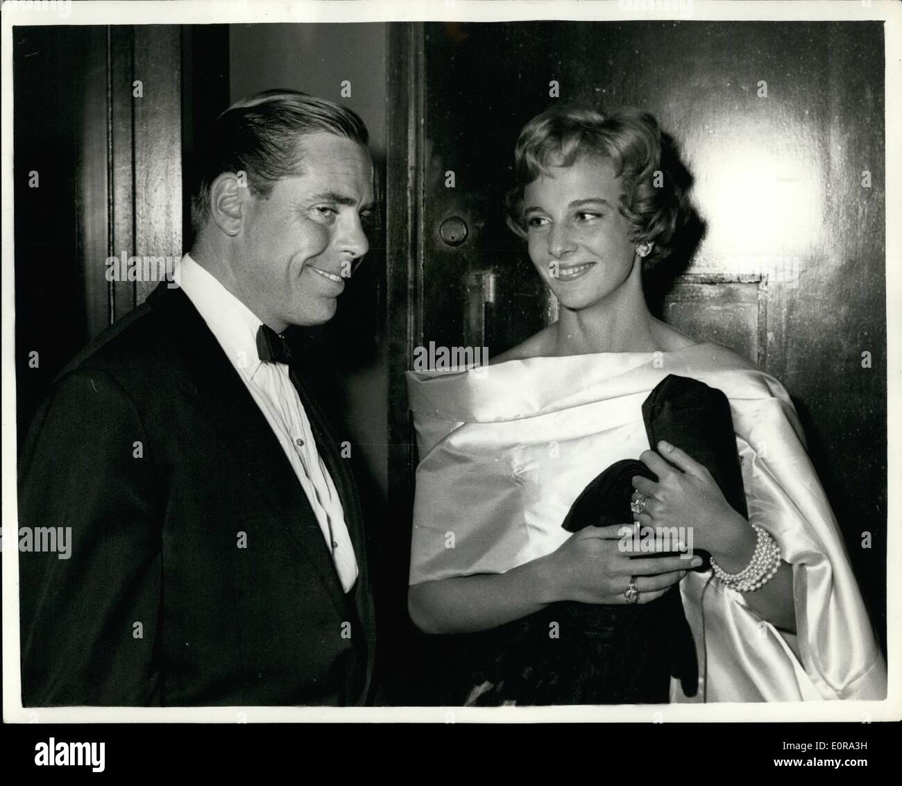 Sep. 09, 1958 - Bobo Sigrist Steps Out With Hollywood's Eligible Bachelor Heiress Bobo Sigrist who separated from her husband Gregg Juarez three months ago turned up at the first night of T.S. Eliot's ''The Elder Statesman'' at the Cambridge Theatre. She was on the arm of the handsome young film producer Kevin McGlory for her first night out in the West End since she arrived in London. Kevin said he was a very old friend of Bobo's mother, who he had known for years Stock Photo