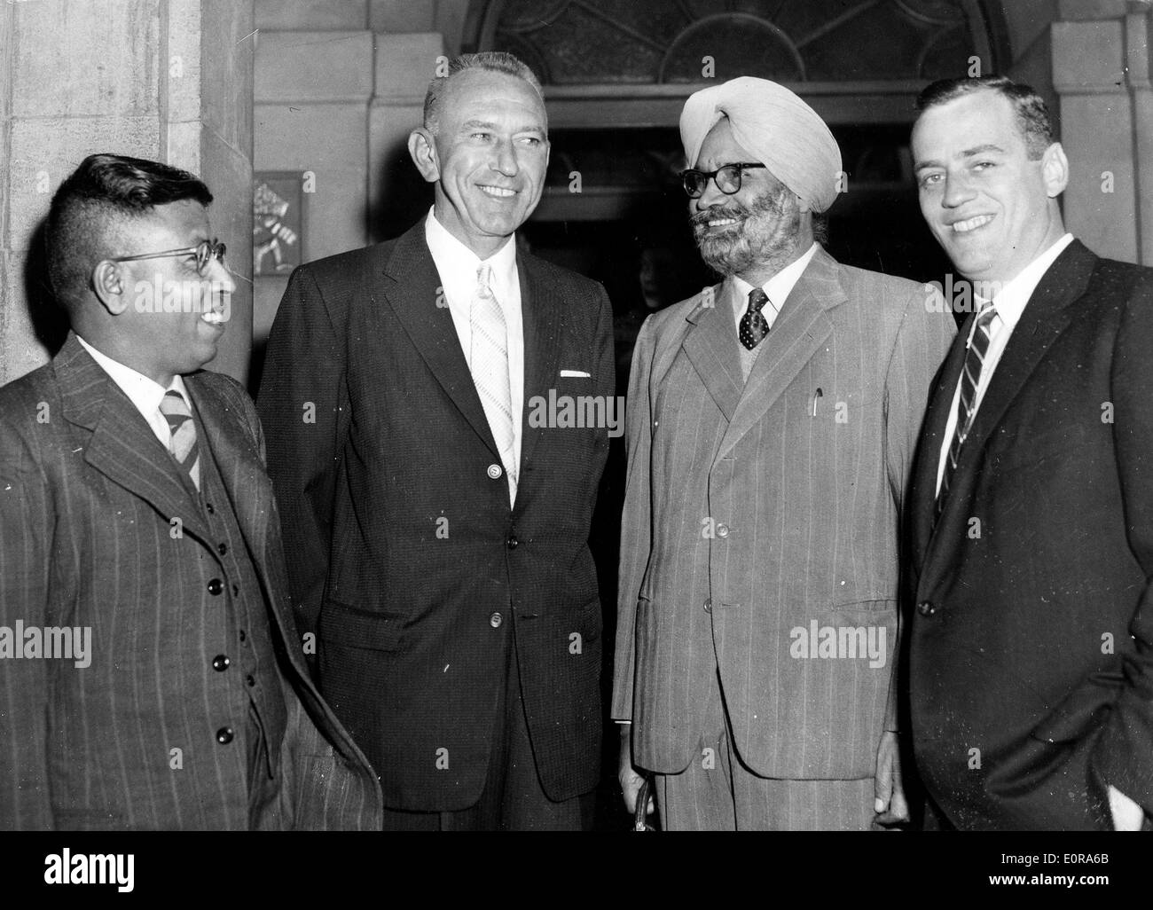 Sep 15, 1958; London, UK; Delegates of India, S.M.DUTT(India), V.E. BAUGHMAN (USA), G. SINGH (New Delhi), and MYLES J. AMBROSE (USA) at the Interpol Conference. Stock Photo