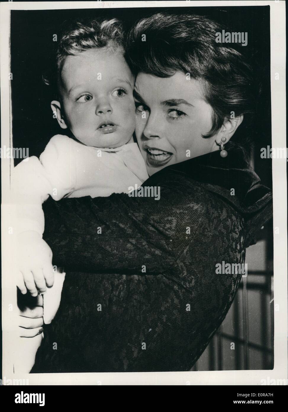 Nov. 11, 1958 - Judge gives Dawn's baby to her Italian husband: A Civil Court judge today granted a provisional decree of separation to British actress Dawn Addams and her Italian husband Prince Vittorio Massimo. Temporary custody of their only child, 3 year old Stefano, was given to the Prince. The judge made provision for Dawn to see the child any time. Photo shows Dawn Addams pictured with her young son Stephano. Stock Photo