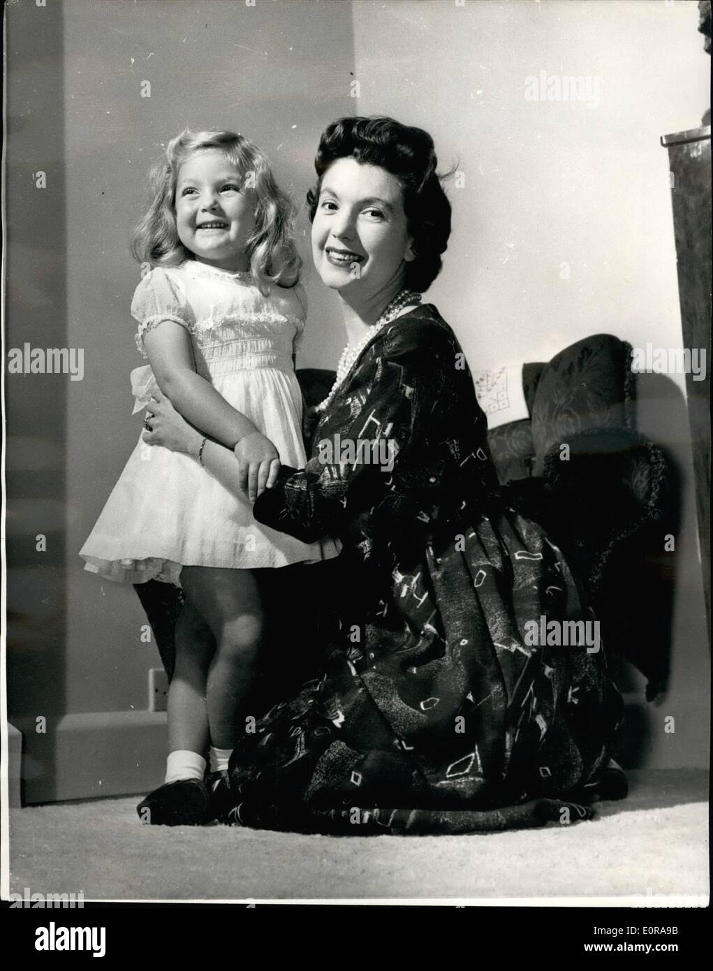 Nov. 11, 1958 - Sylvia Peters to Leave the B.B.C... She Wants to Spend More Time With Her Daughter. Britain's best known woman TV announcer Sylvia Peters announced yesterday that she is leaving the B.B.C. and giving up her career so that she can become a housewife and mother to her three year old daughter Carmella... Sylvia, who is 32 - first appeared before the TV cameras in 1947 and since then has announced more than 7,500 programmes Stock Photo