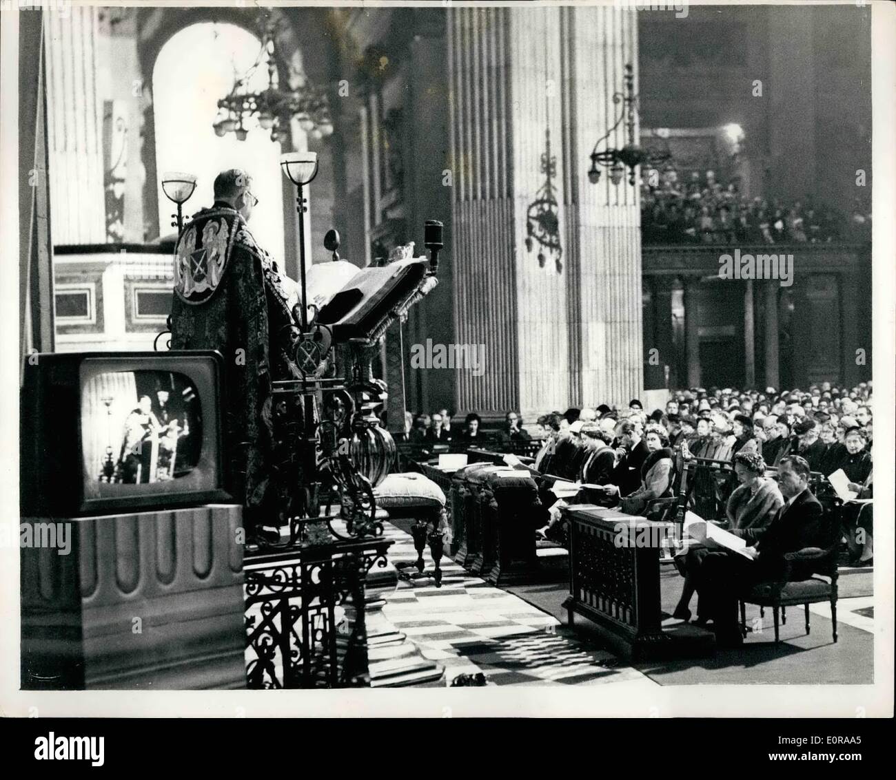 Nov. 11, 1958 - Service at Dedication of American Chapel in St. Paul's Cathedral: Photo shows scene during the service which preceded dedication of the new American Chapel in St. Paul's Cathedral today. The Canon-in-residence reads the lesson - with facing him in front row Right to left Mr. Richard Nixon (American Vice President); Mrs. Nixon; H.M.The Queen; Princess Royal; Duchess of Kent; and Princess Alexandra of Kent. Note the 21inch television set on left. It was one of ten installed so that all those in the congregation could see the ceremony clearly. Stock Photo