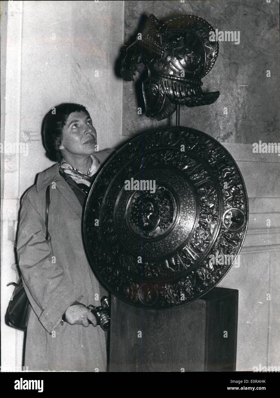 Nov. 11, 1958 - In memory of Emperor Karl V;,A memory exhibition was opened in the weapon-collection of the Vienna-New Castle on Nove 15th th4e 400th anniversary death of Emperor V. in the empire of whom the sun never sunk. Photo Shows the Southwester and the round armoured shield of Karl V. made by Filippo ethnicli of Milano at about 1541. Stock Photo