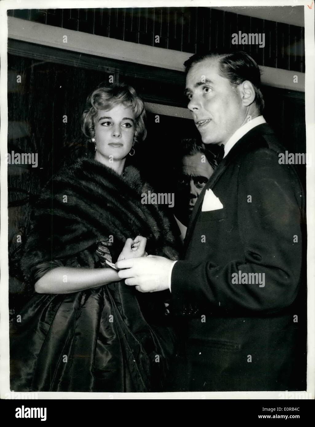 Oct. 10, 1958 - Premiere Of The Film ''I Was Monty's Double''. Bobo Sigrist And American Film Producer. Photo shows Bobo Sigrist the aircraft fortune heiress - who is separated from her husband Gregg Juarez - seen with American film producer Kevin McClory - when they attended the London Premiere of the film ''I Was Monty's Double' Stock Photo