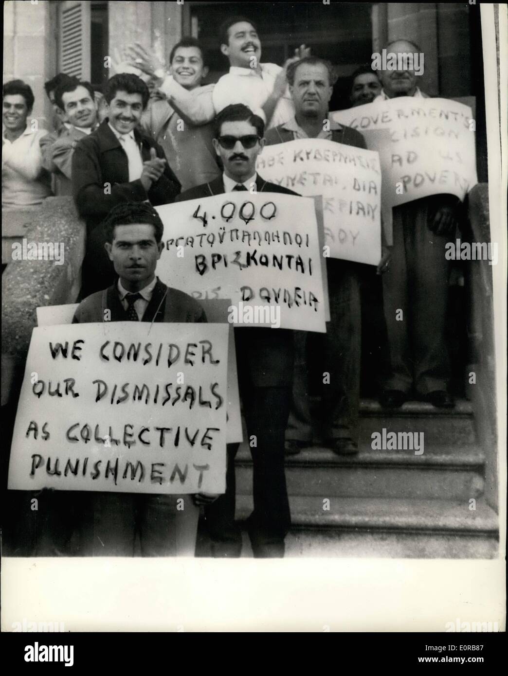 Nov. 11, 1958 - Cypriots dismissed from N.A.A.F.I. hold demonstration in streets of Nicosia.: Cypriots who were dismissed from the NAAFI centre in Cyprus for security reasons held a demonstration recently in the streets of Nicosia protesting against the order. Photo shows some of the demonstrators with their placards during the parade in Nicosia. Stock Photo