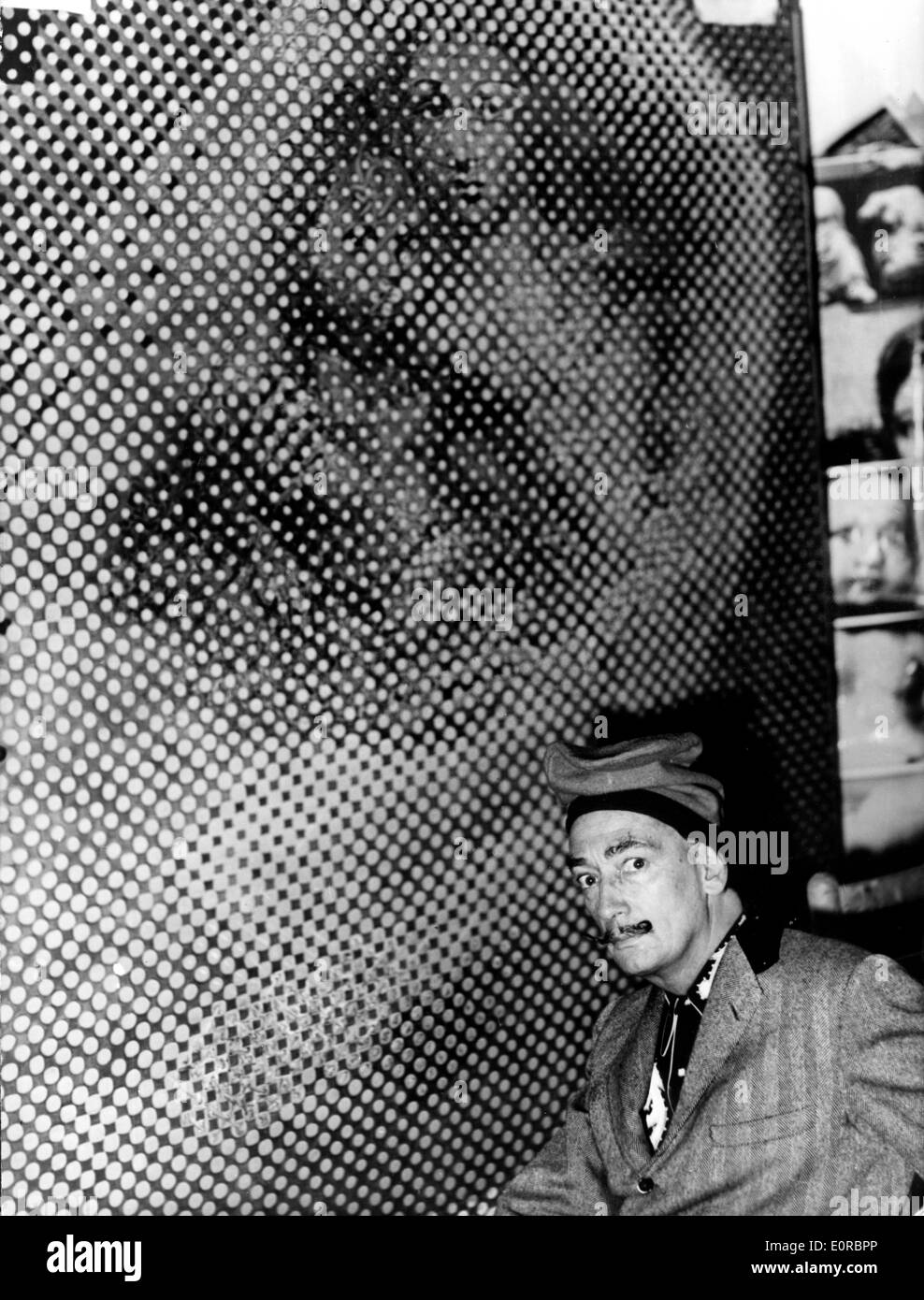 Salvador Dali with his painting the 'Sistine Madonna' Stock Photo