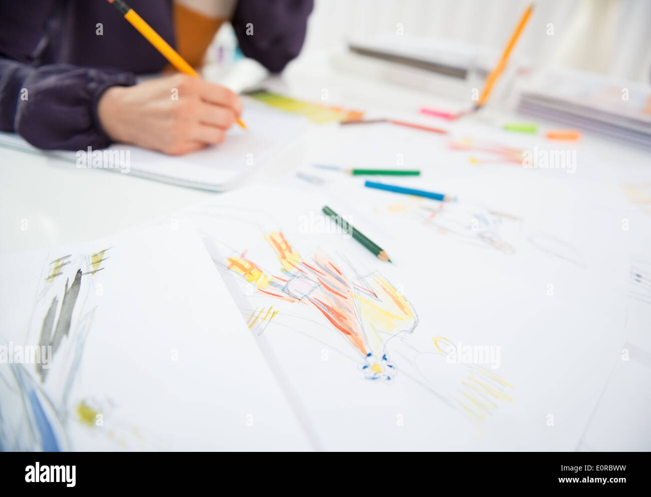 Female fashion designer drawing sketches hi-res stock photography and ...