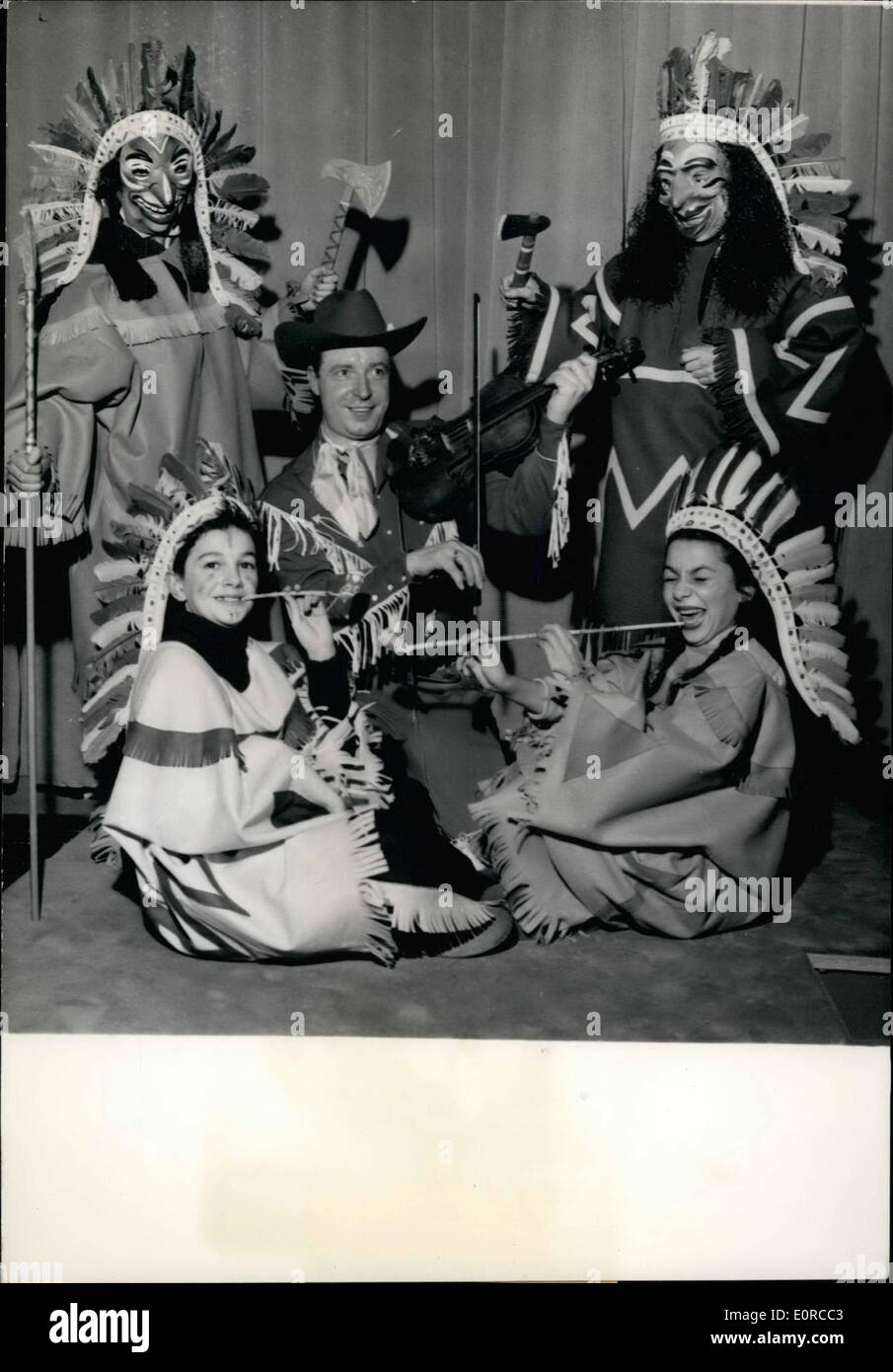 Jan. 01, 1959 - Meet the big chief and the little squaw. Marc Taynor and his band coupled with the election of a Big Chief and the Little Squaw were one of the attractions at Printemps, the famous Paris Department Store. 13-year-old Anne Marie Pinez, elected Little Squaw and 14-year-old Christian Duhamel, the Big Chief with two old red skins. Marc Taynor is seen entertaining them to one of his successes. Jan. 16/59 Stock Photo