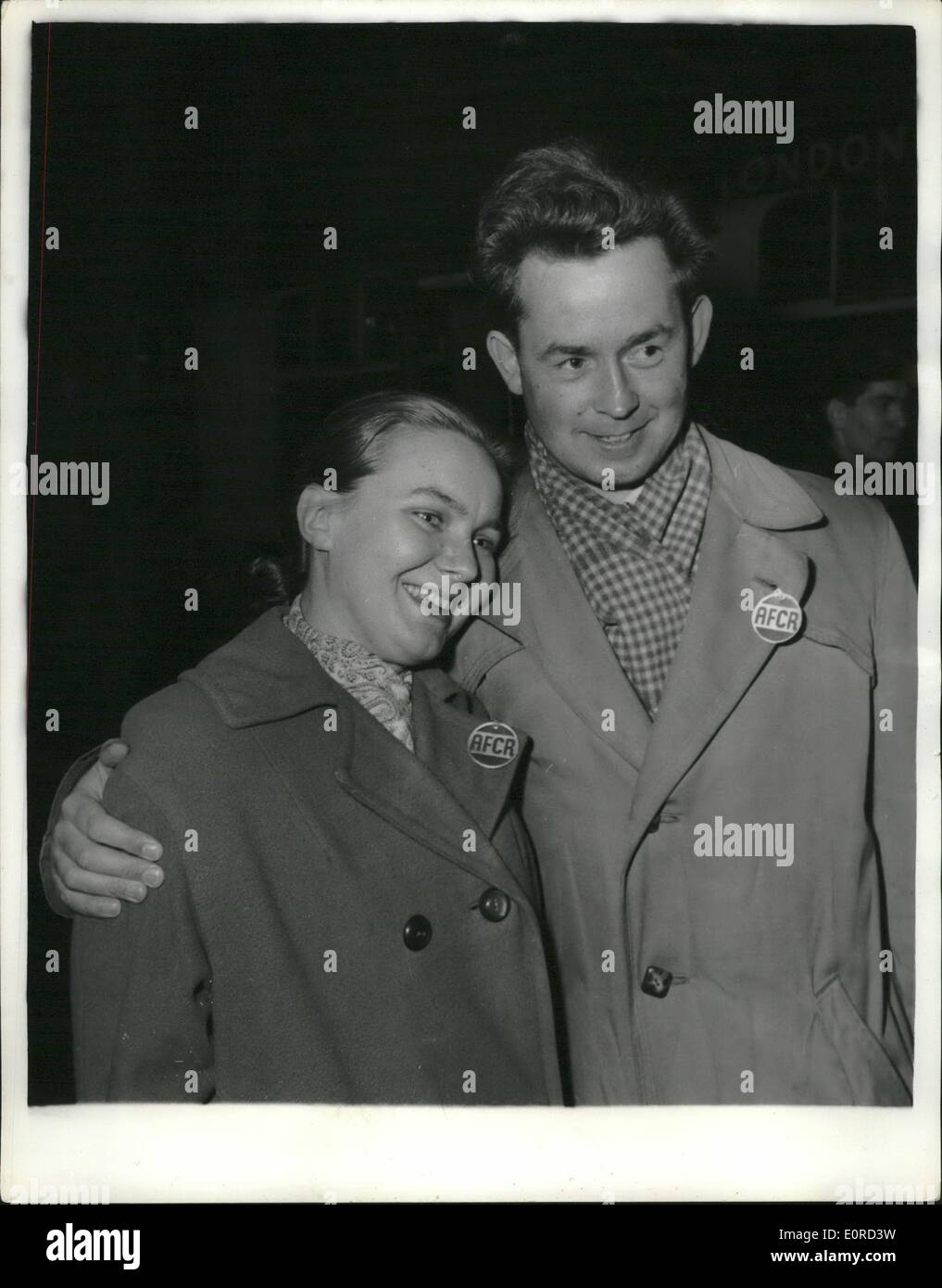 Mar. 03, 1959 - They Risked death for freedom: Mrs. Anne Zemanek, 24, and her husband, Zdenek, 27, who risked death to make a 15-minute flight to freedom fro Czechoslovakia, pictured last night when they arrived in London. They had planned their escape for years after seeing political prisoners slaving in the uranium mines at jachymov, where they were school teachers. Both managed to get a transfer to he spa town of karlsbad - 15 minutes flying time from the west German border. There they joined a flying club and spent months awaiting their chance Stock Photo