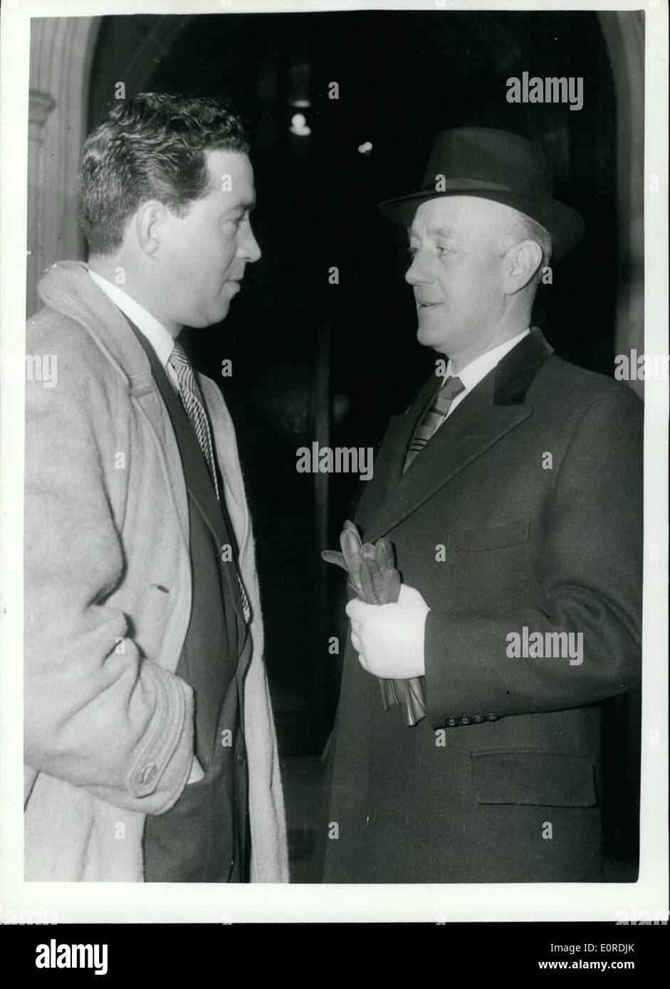 Feb. 02, 1959 - Film Stars Attend All Party Meeting Of M.P.'S: A group of leading British film stars, this afternoon attended an All Party Meeting of Members of Parliament in the House of Commons to ask M.P,'s pass for the abolition of Cinema Tax. Phot Shows Sir Alec Guinness, who led the delegation, with John Gregson, at the House of Commons this afternoon. Stock Photo