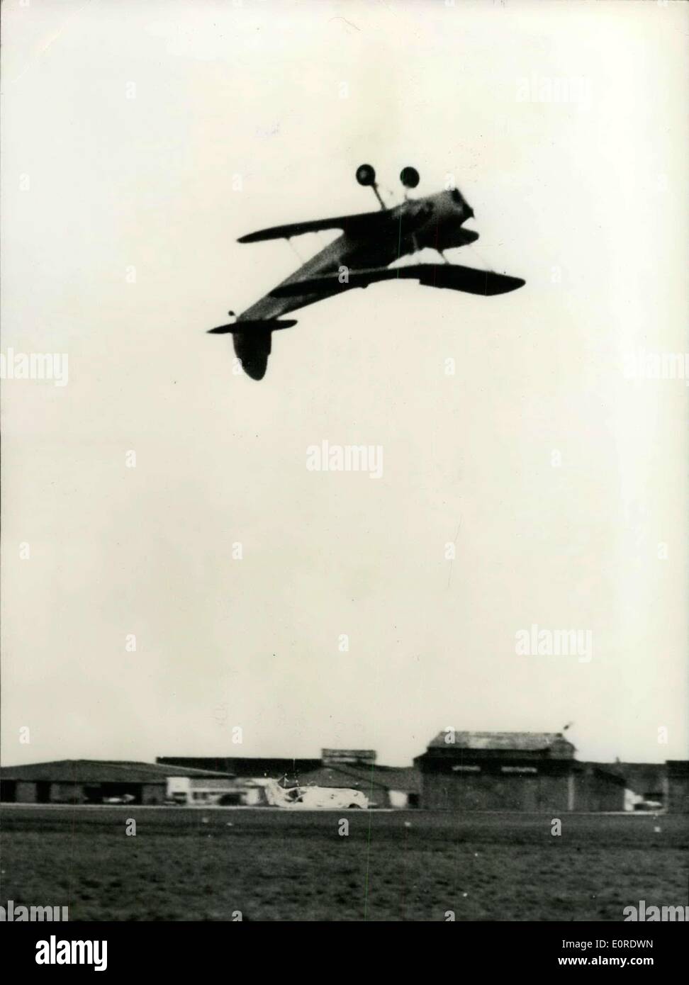 Mar. 31, 1959 - French Pilot Breaks Record Of ''Back Flying'': Jean Falloux, 28, An Air France Training Pilot, Flying A Small Plane ''Stampe'' Broke A Record Of ''Back Flying'' (2 Hours 40 Seconds) Yesterday. Photo shows The Plane During The ''Back Flying'' Record. Stock Photo