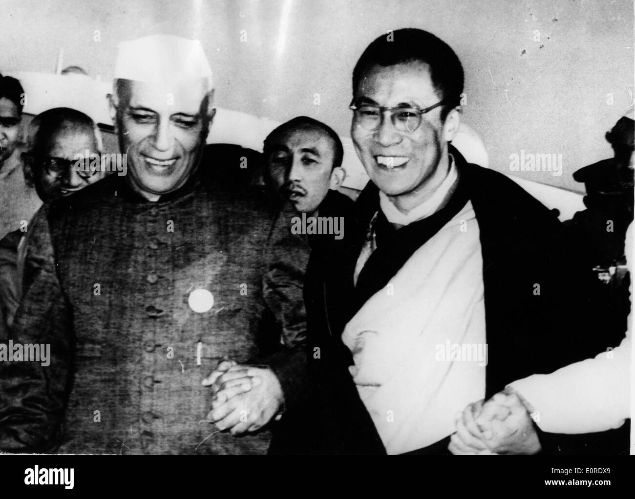 The 14th Dalai Lama is welcomed to India by Jawaharlal Nehru Stock Photo