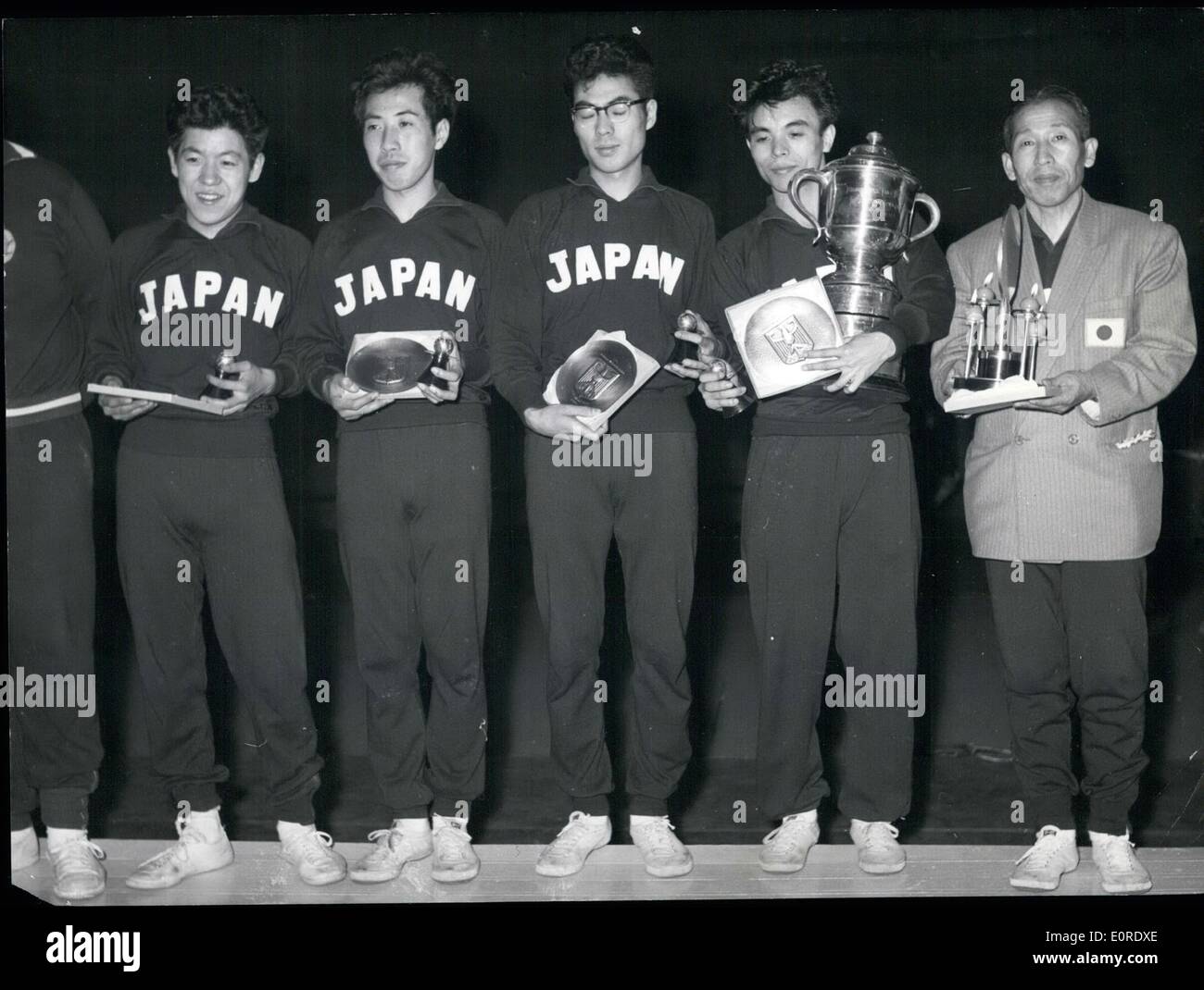 Apr. 04, 1959 - World Championship in Table Tennis 1959 in Dortmund / Germany In the World Championship in Table Tennis 1959 which was held from March 27th till April 5th, 1959 in Dortmund/Germany on March 31st the title of the Team-World champion was given to the Japanese teams, both women and men team. The women were able to beat the Korean team after hard combat, and the men beat the Hungarian team (2nd) 5:1. O.p.s:- The male team of the Japanese World-Champion (left to right) Seiji Narita, Nobuya Hoshino, Teruo Murakami, Ischiro Ogimura who has twice been world-champion, and their trainer Stock Photo