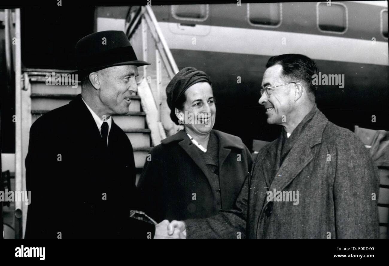 Apr. 04, 1959 - President of Yale-University in Frankfurt: Mr. A.W. Griswold, President of the Yale-University, arrived in Frankfurt, Germyn, today for an official visit to Bonn and Berlin. Mr. Griswold will during his stay in Bonn be received by Federal President Heuss. Photo shows Mr. and Mrs. Griswold are welcomed by Mr. Myers (right), Attache for Cultural Affairs at the US-Embassy at Bonn. Stock Photo