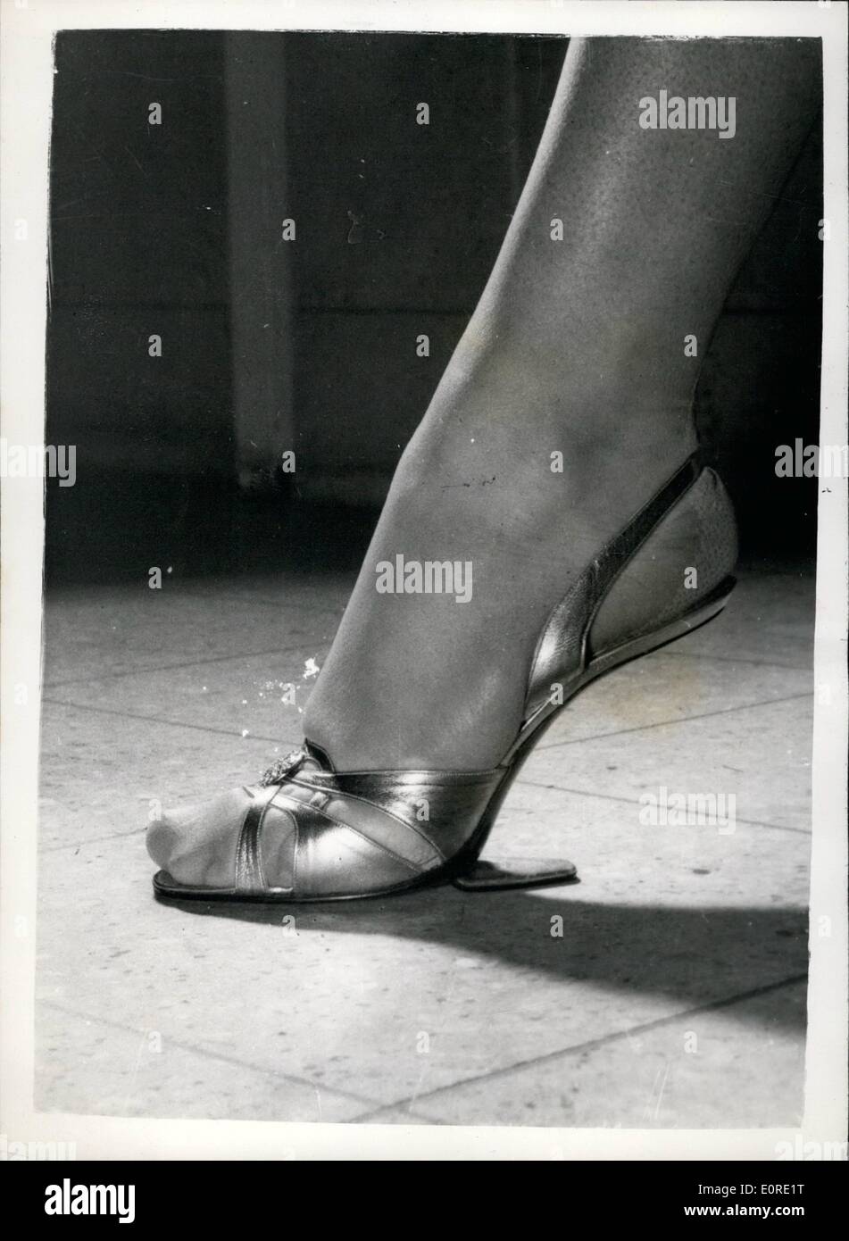 Feb. 02, 1959 - HERE IS THE SHOW SHOW OF THE FUTURE - THE SHOE WITH NO HEELS Here is the shoe of the future for the female the shoe you'll never need to have hulled because there are no heels. If you're worried about walking in court shoes without heels, then don't be, because they are held up by a strong metal support (which also gives balance to the shoe) that juts out from the sole to the instep. These heelless court shoes were the sensation of the Italian fashion shows Stock Photo