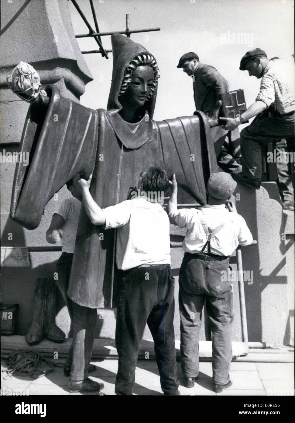 Apr. 04, 1959 - The ''Munchner Kindl'' sing of Munich has been installed at the Gebsttel Bridge in Munich. The sculptor Erich Hoffman has designed the two ''Muncher Kindl'' which are sculptured in bronze material. Muncher Kindl means Munich Child. Stock Photo