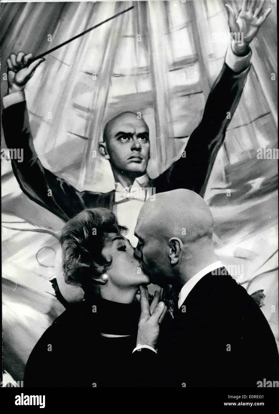 Apr. 04, 1959 - Yule Brynner Films in Paris: The famous American actor is in Paris now for the filming of ''Once more with feeling'', produced and directed by Stanley Donen. IN this film, Yul Brynner plays the part of a Conductor. photo shows A Scene of the film : Yul Brynner with his partner, Kay Kendall. Stock Photo