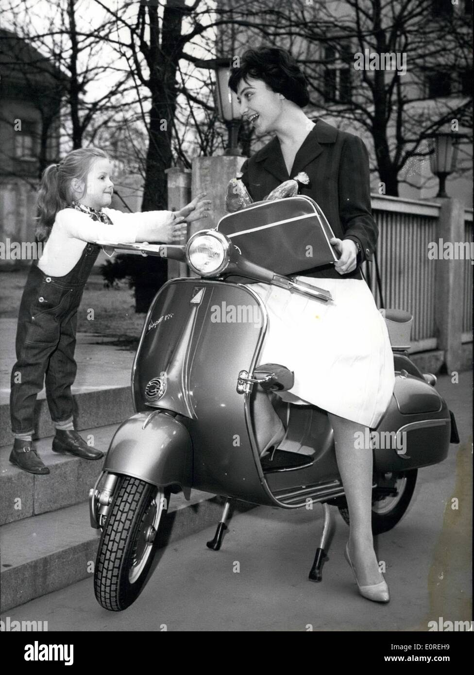 Mar. 03, 1959 - The new Vespa Touren 150.... these days was introduced to the press. At this model, important change of the Vespa-motor has been made since 1946. The main disadvantage was that 50 of the oil had nor been used because of the warmth of the cylinder (they had burnt away). This has now been changed and the Vespa will be much more profitable. There will also be no annoying smoke any more, the costs for keeping were reduced and also the price for the petrol-mixture. To make this mixture, the Vespa has its own mix-cup Stock Photo