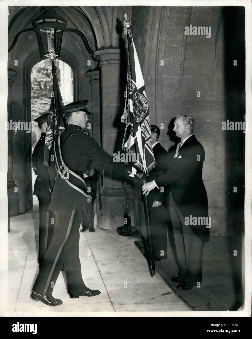May 22, 1959 - 22-5-59 Laying up of Colours of the Royal Berkshire Regiment. The Colours of the 1st. Bn. The Royal Berkshire Regiment, were laid up today in the State Apartments at Windsor Castle. The Royal Berkshire Regiment and the Wiltshire Regiment are to amalgamate at Albany Barracks, Newport, Isle of Wight, on June 9th, to form the Duke of Edinburgh's Royal Regiment (Berkshire and Wiltshire). Keystone Photo Shows: The Colours of the 1st. Bn. Royal Berkshire Regiment, being handed over to Superintendent of the Castle, Mr. S. Lucking today. Stock Photo