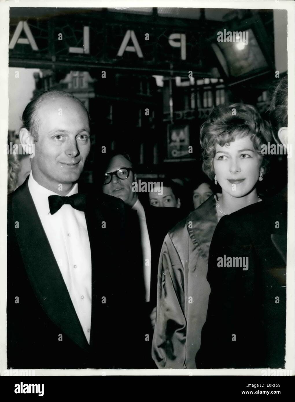 May 05, 1959 - John Osborne's new musical is booed at the first night.: Booes from the gallery and cheers from the stalls greeted John Osborne's new musical '' The world of Paul Slickey'', at the palace theatre, London, last night. Photo shows Newly-weds lord and lady Montague, just back from their honeymoon, turned up for the first night. Stock Photo