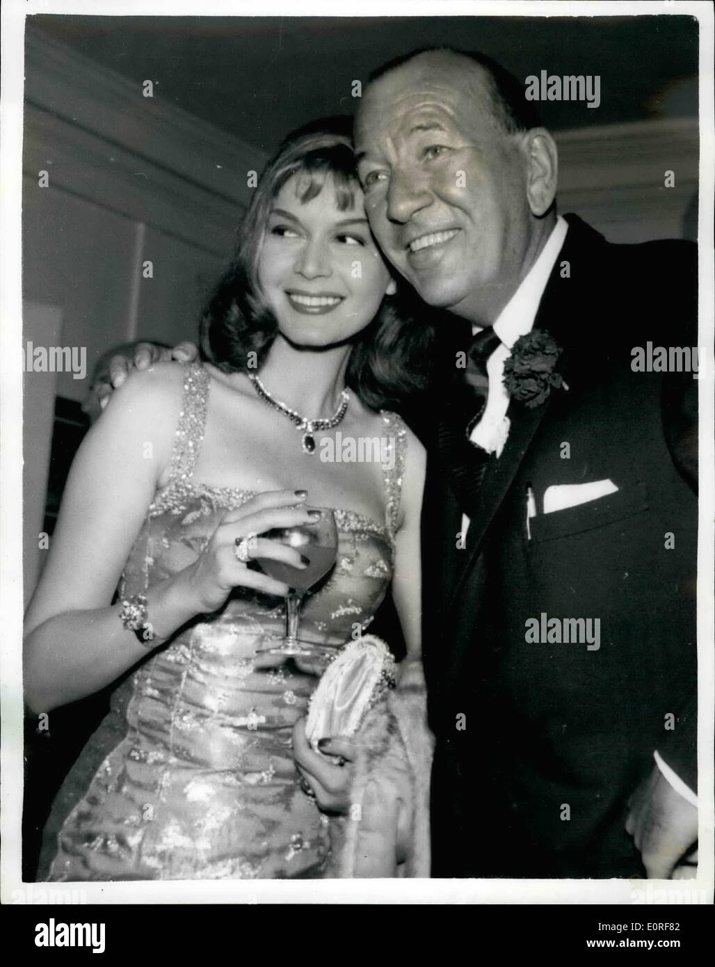 Jun. 06, 1959 - Cocktail Party For Stars Of Charity Matinee. Noel Coward With Eva Bartok: A cocktail party was held in Bloomsbury last night as a get-together in readiness for the Night of 100 Stars - Charity Matinee - organized by Noel Coward. Photo shows Noel Coward with Eva Bartok at the party last night. Stock Photo