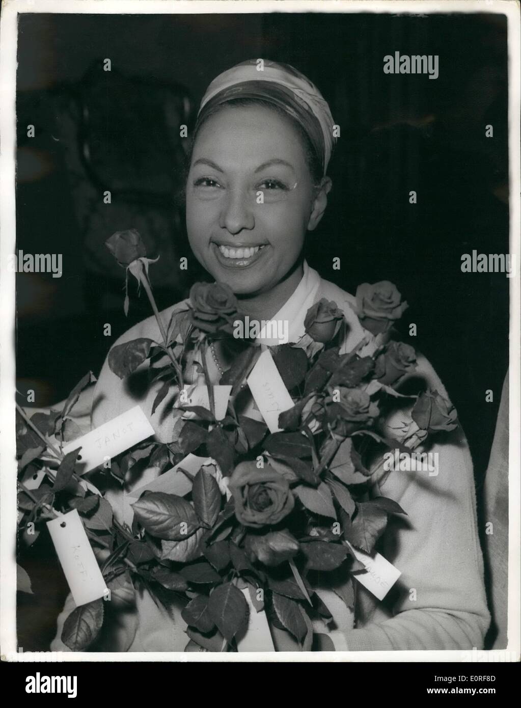 Jun. 06, 1959 - Josephine Baker in London. To Appear on TV tonight.: Josephine Baker, who arrived in London today, takes part this evening in the B.B.C. TV shows ''It Happened To Me'' - which shows scenes from her life and her famous adopted family. Photo shows Josephine Baker with a bunch of red roses sent to her by her adopted children in France - at this afternoon's rehearsal. Stock Photo