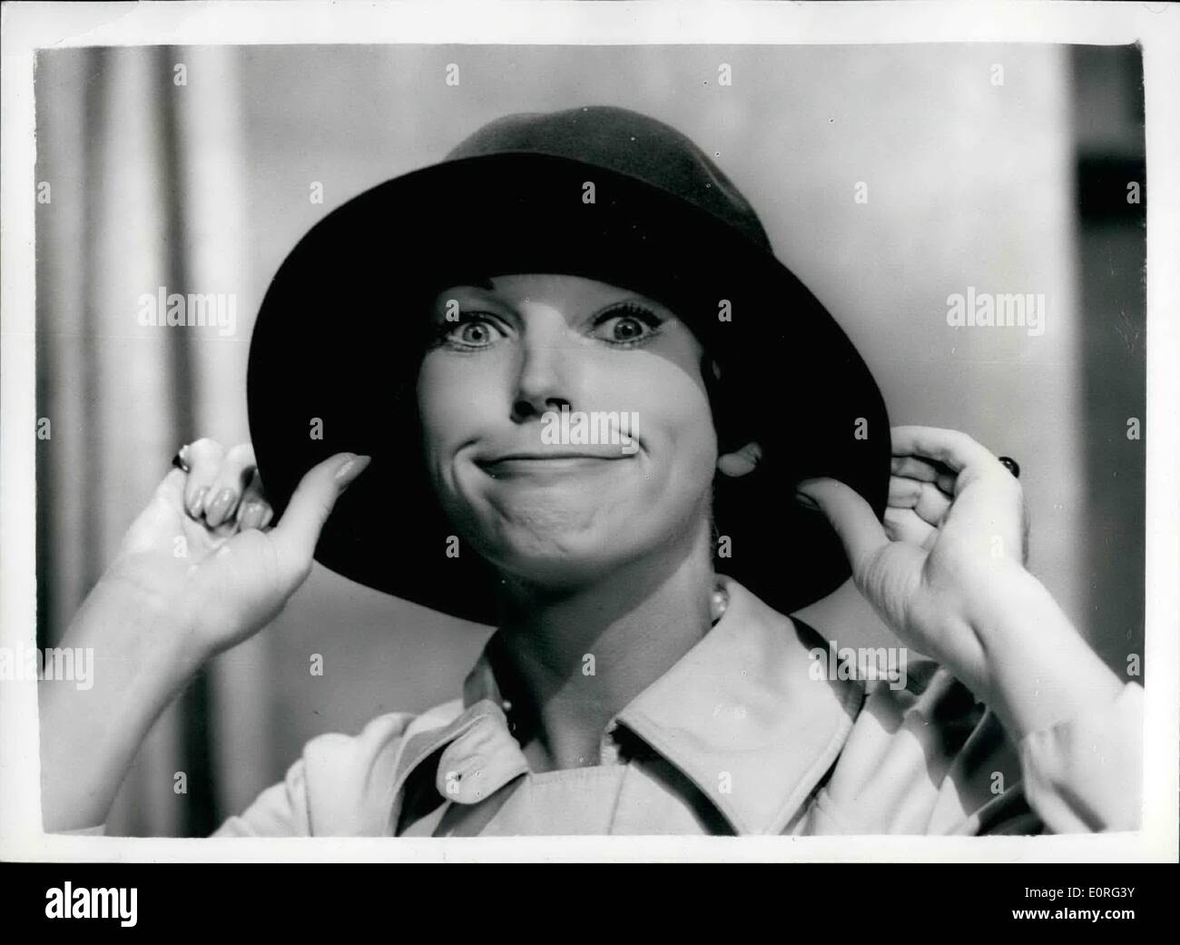 Aug. 08, 1959 - Dawn Addams Rehearses for First BBC TV Play. Actress Dawn Addams was to be seen at the Riverside Studios this morning rehearsing for her part in ''The Millionaires: - her first BBC TV Play - to be shown on Sunday Sept. 6th. Keystone Photo Shows: Dawn Addams makes a grimace at the camera - as she wears a man's hat - as she appears in the play today. Stock Photo