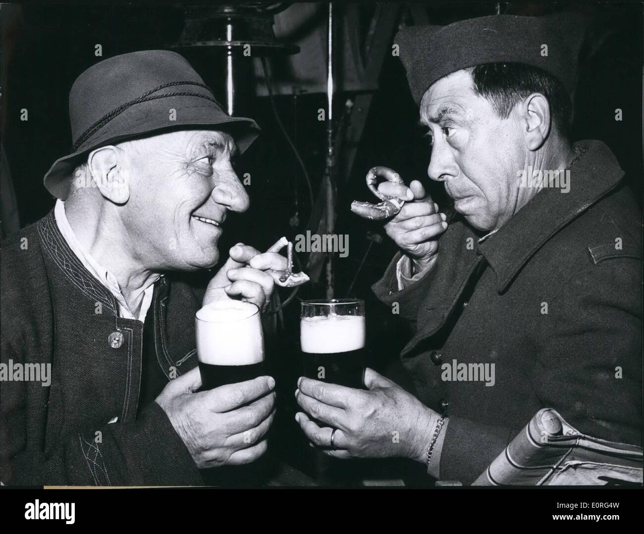 Aug. 08, 1959 - 1 : 0 for Fernandel: Fernandel, the French actor, soon made friends with the German beer, because he sometimes had to work for the film ''I and the cow'' in a heat of as much as 30 centigrades As French prisoner of war, in this film he walks throug the whole of Germany, together with his four - legged companion, in order to get to his beloved Paris Stock Photo