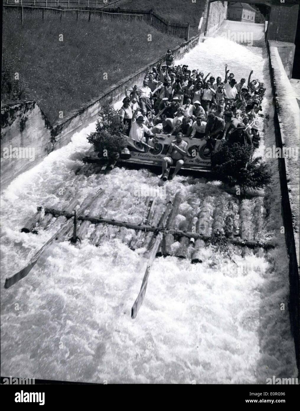 Jun. 23, 1959 - They're floating again! The Munich floating-parties have begun with great fun. ''On Bord'' everyone danced, drank a lot of beer and ate the traditional ''Weisswursto'' (white saussages). OPS: The first raft floating wildly through the longest floating channel in Europe near Muhithal (Bavaria) Stock Photo