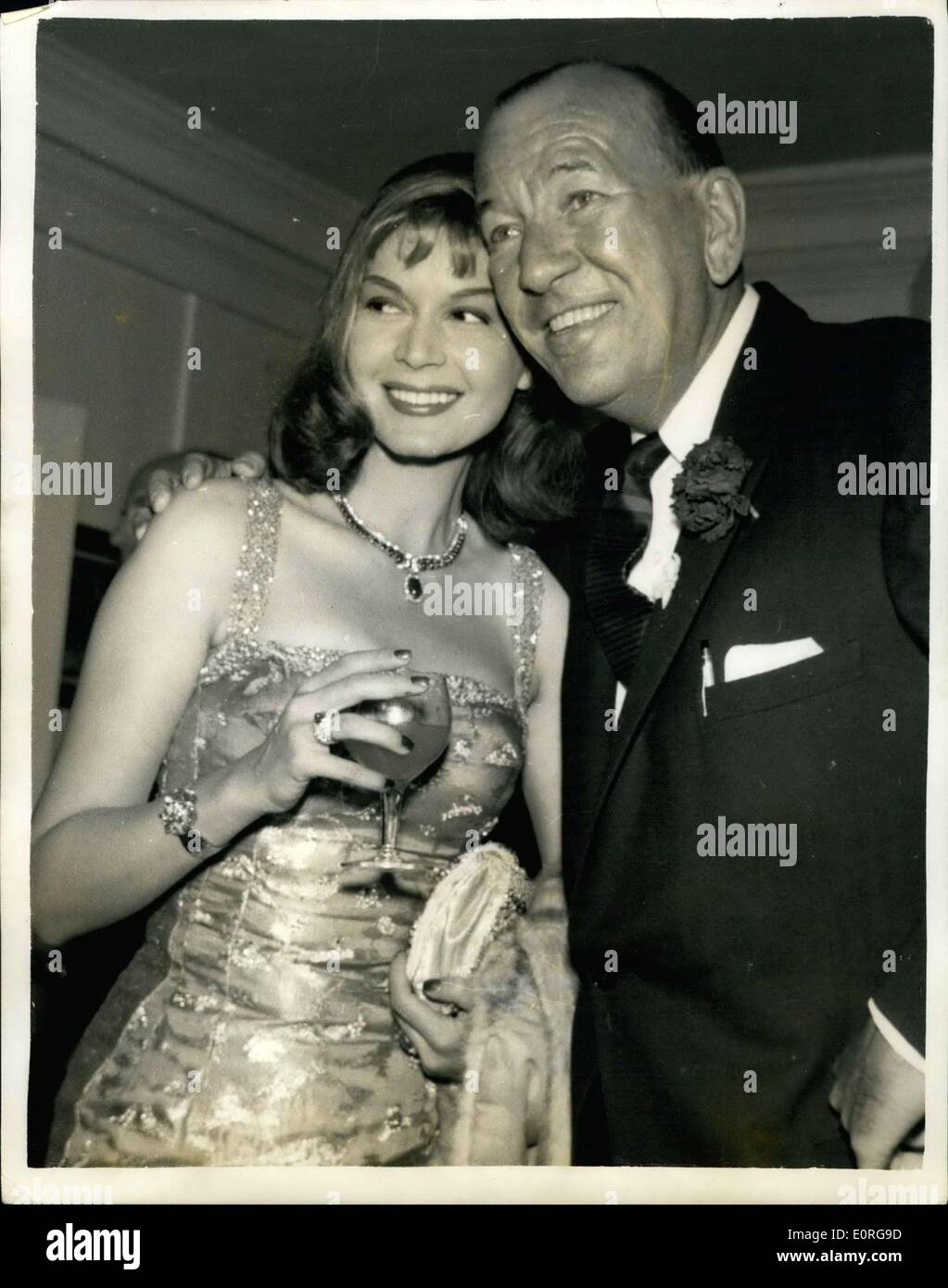 Jun. 24, 1959 - Cocktail Party for Stars of Charity Matinee, Noel Coward with Eva Bartok. A Cocktail party was held in Bloomsbury last night as a get together in readiness for the night of 100 stars, Charity Matinee, organized by Noel Coward. Keystone Photo Shows: Noel Coward with Eva Bartok at the party last night. Stock Photo