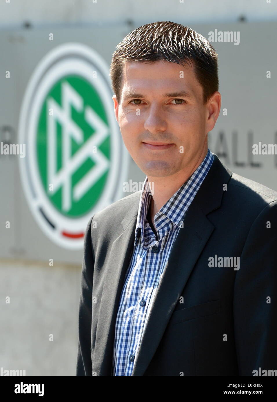 Frankfurt Main, Germany. 19th May, 2014. The linesman from the German Football Association (DFB), Stefan Lupp stand during a press conference outside of DFB headquarters in Frankfurt Main, Germany, 19 May 2014. Photo: ROLAND HOLSCHNEIDER/dpa/Alamy Live News Stock Photo