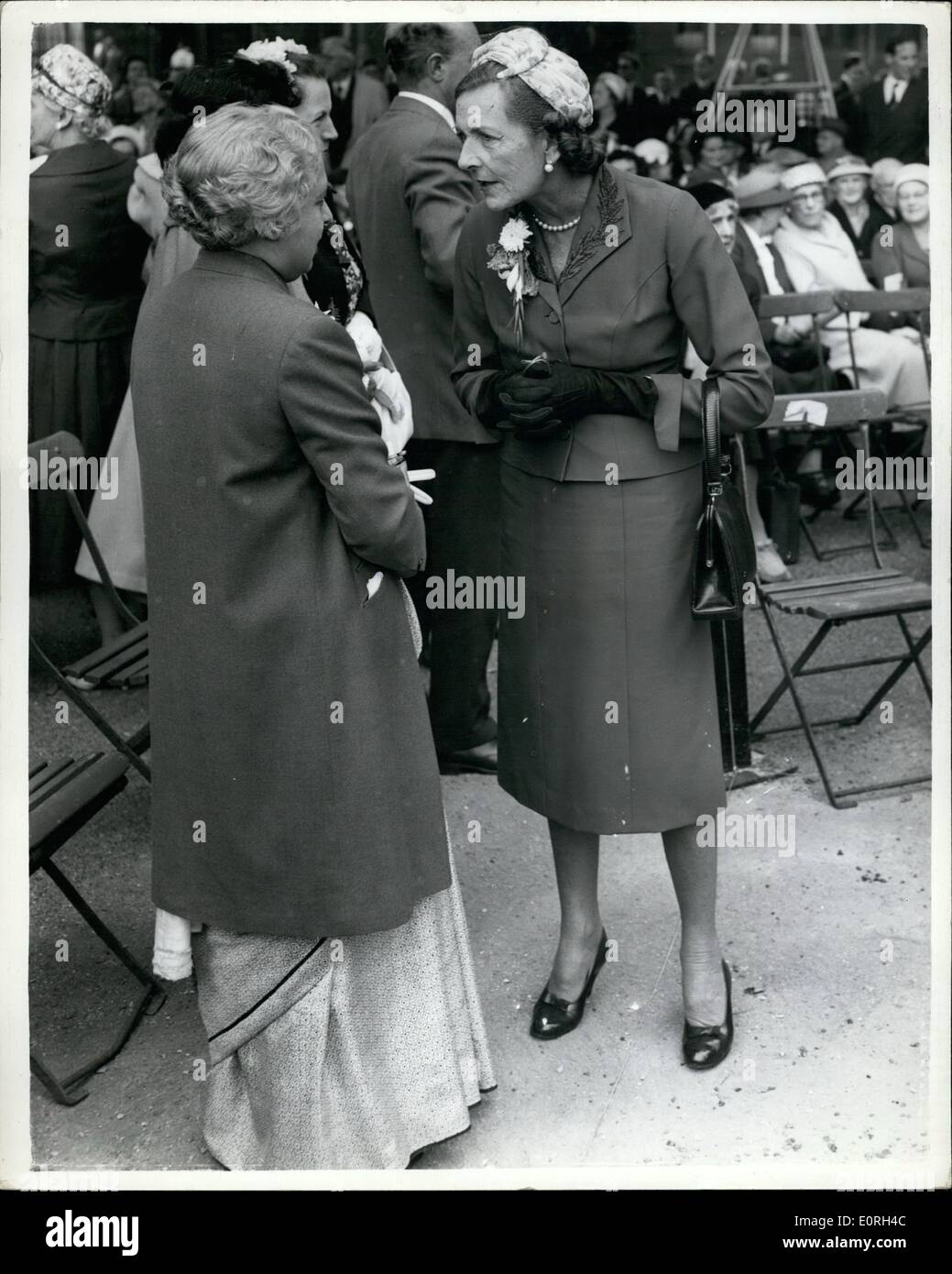 Jul. 07, 1959 - New Memorial to Dame Christabel Pankhurst Unveiled: A new memorial to Dame Christabel Pankhurst which has been added to the statue of her mother Mrs. Emmeline Pankhurst, was unveiled this morning at Victoria Gardens, near House of Lords. Photo Shows Lady Mountbatten speaks to Mrs. Pandit the high Commissioner for India - at the ceremony today. Stock Photo