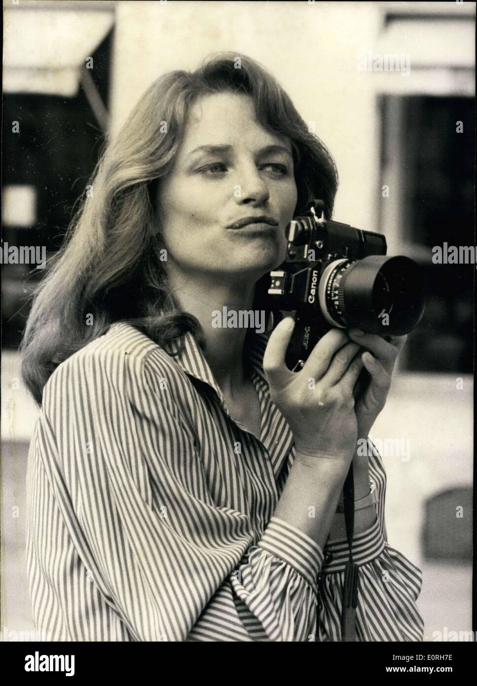 Sep. 07, 1959 - Charlotte Rampling, the famous movie star, is an actress and a photographer. We see her here in the process of taking a few pictures of ready-to-wear designs presented yesterday afternoon by the Parisian clothing designer Christian Charrat. Stock Photo