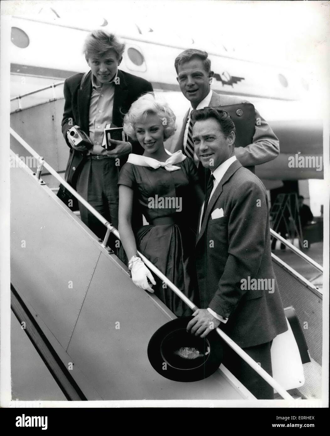 Aug. 08, 1959 - British Stars Leave For Moscow Film Festival: Richard Todd; Tommy Steele; Carole Lesley and Peter Arne left London Airport today to represent this country in the International Film Festival in Moscow. Photo Shows: Richard Todd - Tommy Steele - Peter Arne and Carole Lesley at the airport this afternoon. Stock Photo