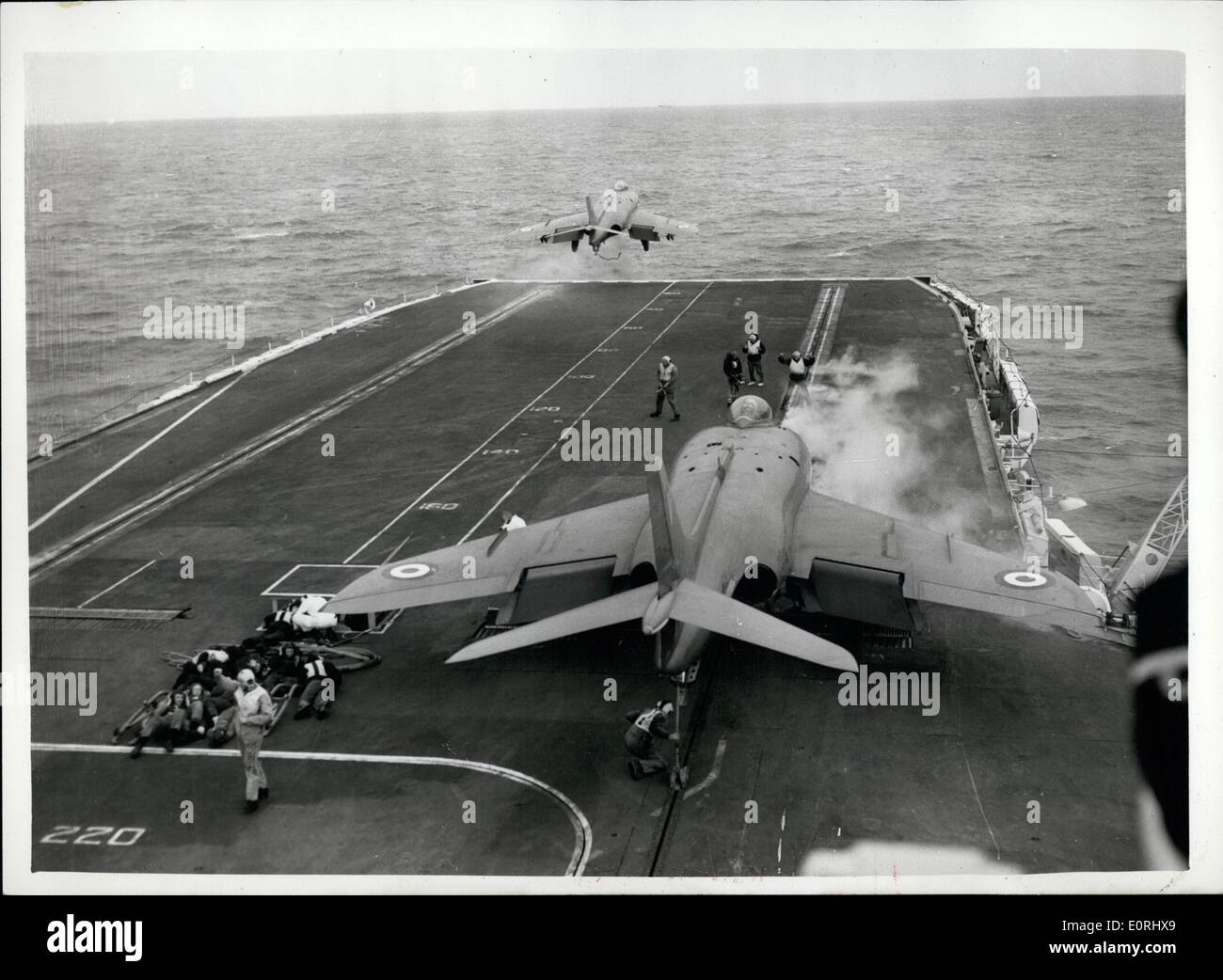 Sep. 17, 1959 - 17-9-59 Flying exercises from H.M.S. Victorious. Members of the press today spent a day at sea in H.M.S. Victorious, flagship of the Aircraft Carrier Squadron, to witness flying exercises, off Portsmouth. Keystone Photo Shows: The scene aboard H.M.S. Victorious today, as Scimitars take off by Steam Catapult, during today's flying exercises. Stock Photo