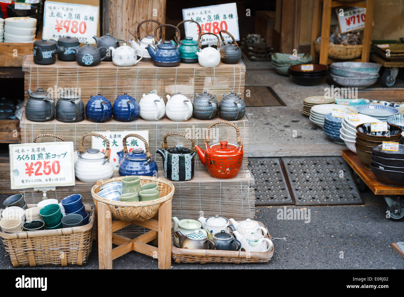Teapots and cups for sale in 'kitchenware street', Asakusa, Japan Stock Photo