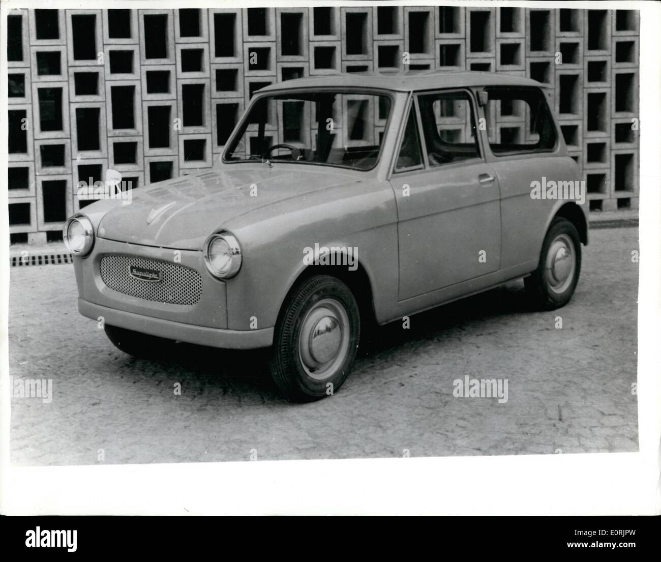 Nov. 30, 1959 - 30-11-59 Introducing the new Japanese People's Car . Another Japanese People's Car is being placed on the foreign market. Known as the Suzulight it is primarily for the U.S. market has top speed of 50 mph with petrol consumption of 50 mpg it is expected to sell in America at about 1,300 dollars. It has a 360 cc two cylinder engine, seats four and weighs 300 kilograms. Stock Photo