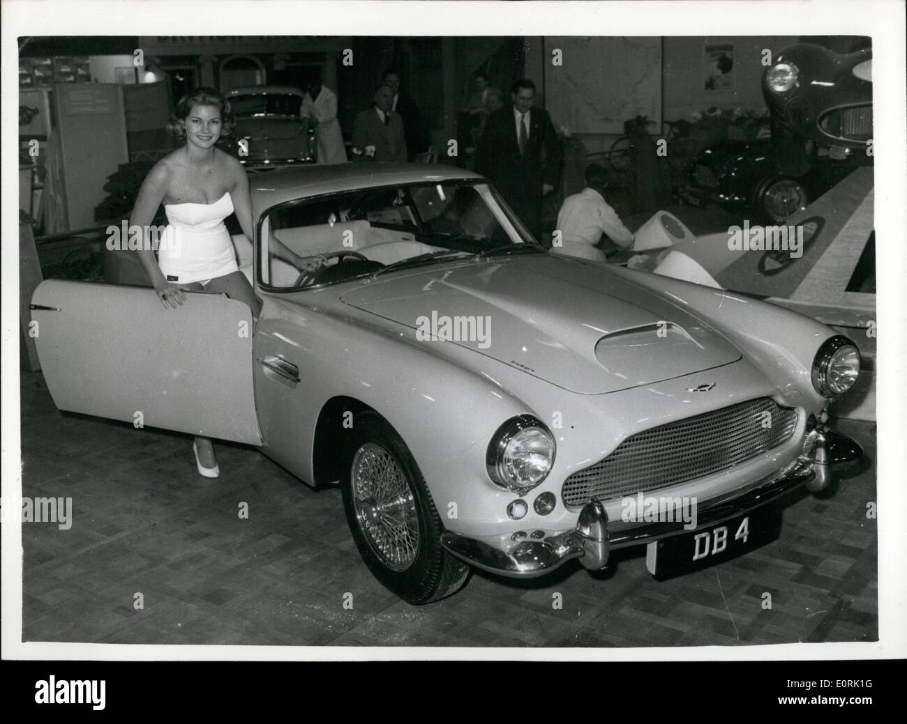 Oct. 10, 1959 - Motor Show Preview - At Earl's Court. ''Miss World'' - And The Aston Martin. Photo shows Penny Coelan the reigning ''Miss World'' - wearing a 1960 swimsuit by Nelbarden seated on the new D. B.4 Aston Martin at the preview today. Stock Photo