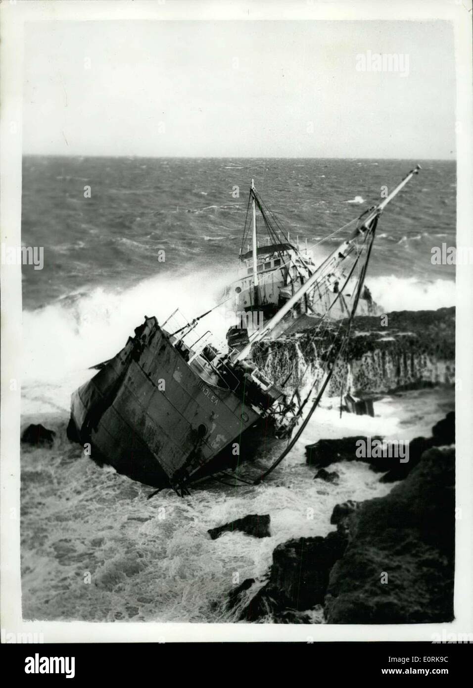 Oct. 29, 1959 - Death on the Rocks - The Camera Captures a Doomed Ship's Agony. This was the agony of the Hindlea, a ship murdered by the fury of the gale and the savage rocks on to which she was driven. She met her death on the rugged coast of Anglesey, at Moelfre. The 506tons Hindlea was one of hundreds of little ships pummelled by giant waves during Tuesday's gale. There were eight men aboard her when she began drifting towards the rocks. They owe their lives to the life boatmen of Moelfre, who made ten runs alongside the doomed ship before they got the crew off Stock Photo