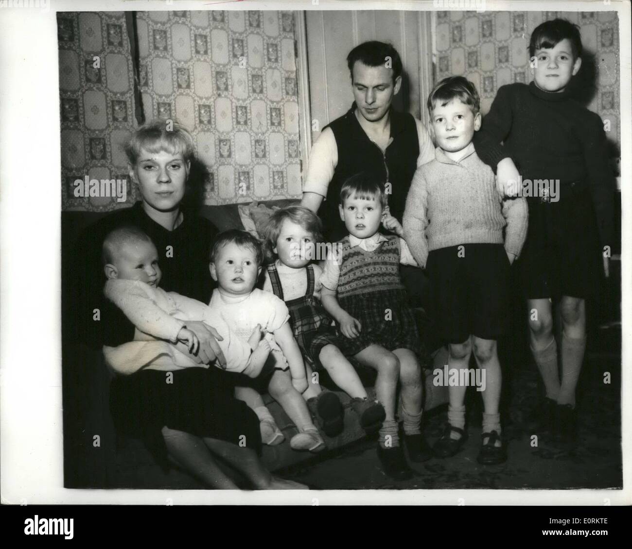 Jan. 01, 1960 - Sheffield parents want to give away five of their six children : twenty nine year old John Mason and his 28 year old wife Margaret of Ellesmere road, she field - have six children aged 5 month to 8 yrs. because of rent arrears - they are expecting to be evicted from their home - so they state that they want to give away five pf the children - have them by his grandparents until the masons are settled once again and could have him back. photo shows Mr. and Mrs Stock Photo