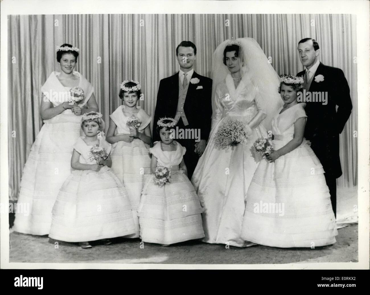 Jan. 01, 1960 - lady Pamela Mountbatten Marries Mr David hicks at Romsey Abbey. Princess Anne was a bridesmaid this afternoon for the first time at the wedding of Lady Pamela Mountbatten, 30 year old daughter of the Earl and Countess Mountbatten, to Mr. David Hicks , an interior decorater. Many members of the Royal family attended the ceremony which took place at Romsey Abbey, Hampshore. Photo shows Newly weds Lady Pamela Mountbatten and Mr Stock Photo