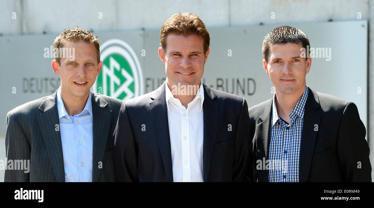 Frankfurt Main, Germany. 19th May, 2014. The referees for the 2014 World Cup from the German Football Association (DFB), Felix (C), Mark Borsch (L) and Stefan Lupp stand during a press conference outside of DFB headquarters in Frankfurt Main, Germany, 19 May 2014. Photo: ROLAND HOLSCHNEIDER/dpa/Alamy Live News Stock Photo