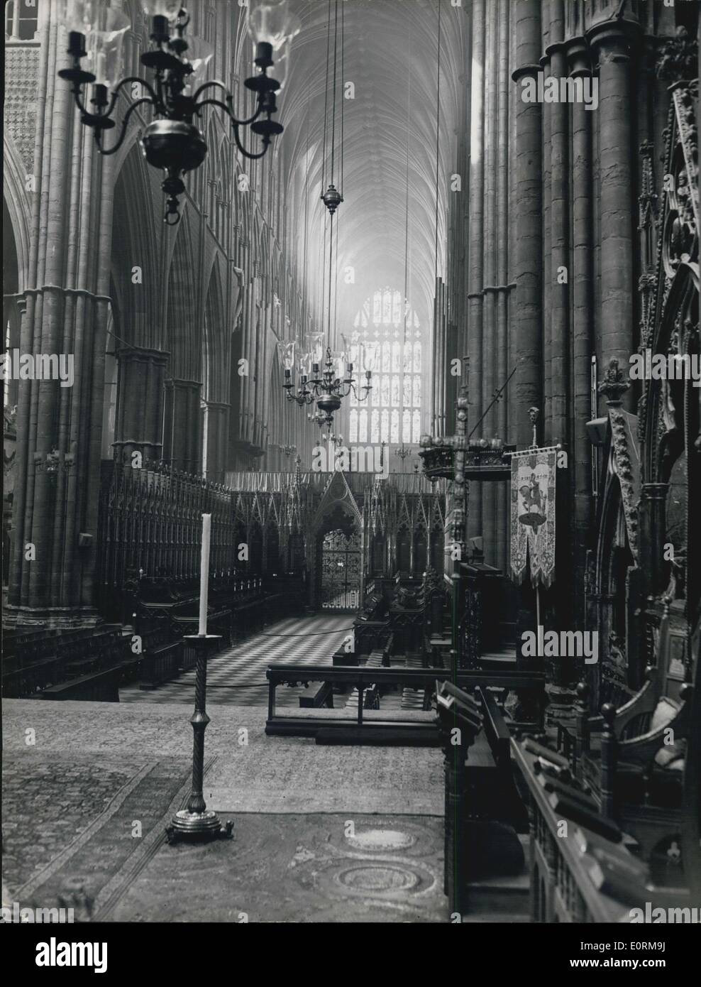 Jan 1, 1960 - Westminster Abbey - scene of the coronation.: Looking down the Nave from the steps of the High Altar in the Sanctuary of Westminster Abbey where Queen Elizabeth will be crowned. On right and left are the choir stalls. Founder of Westminster Abbey was Edward the Confessor who is buried there. At the end of the Nave is the West Door through which the Queen will enter for the Ceremony. Stock Photo