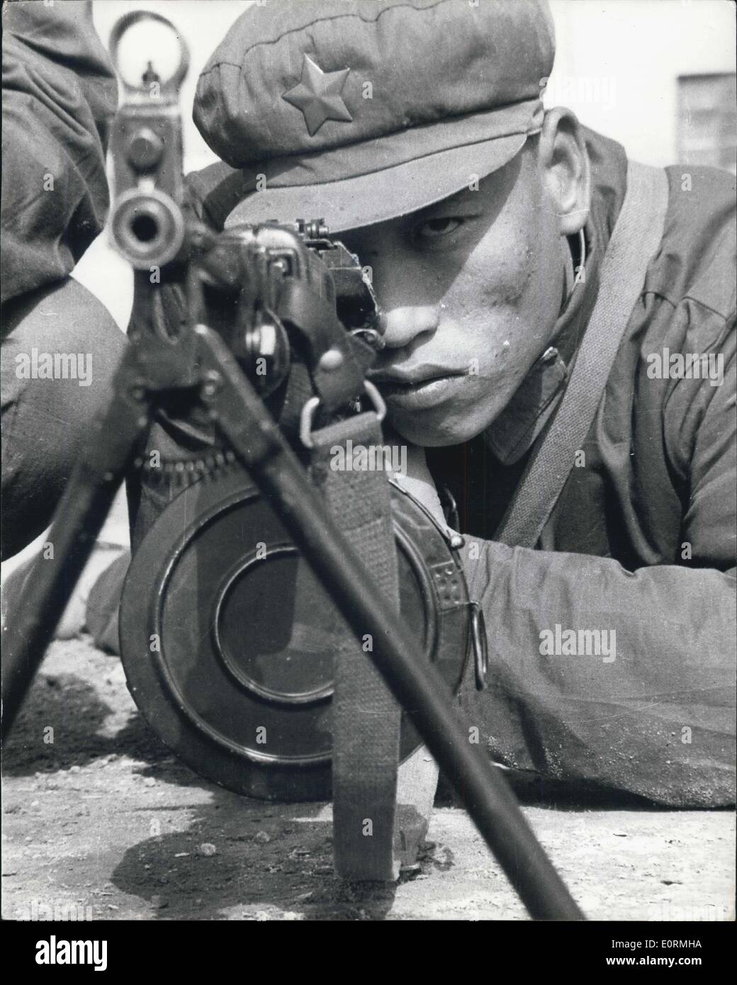 Black and white photo of Chinese soldiers in a trench on the Jehol