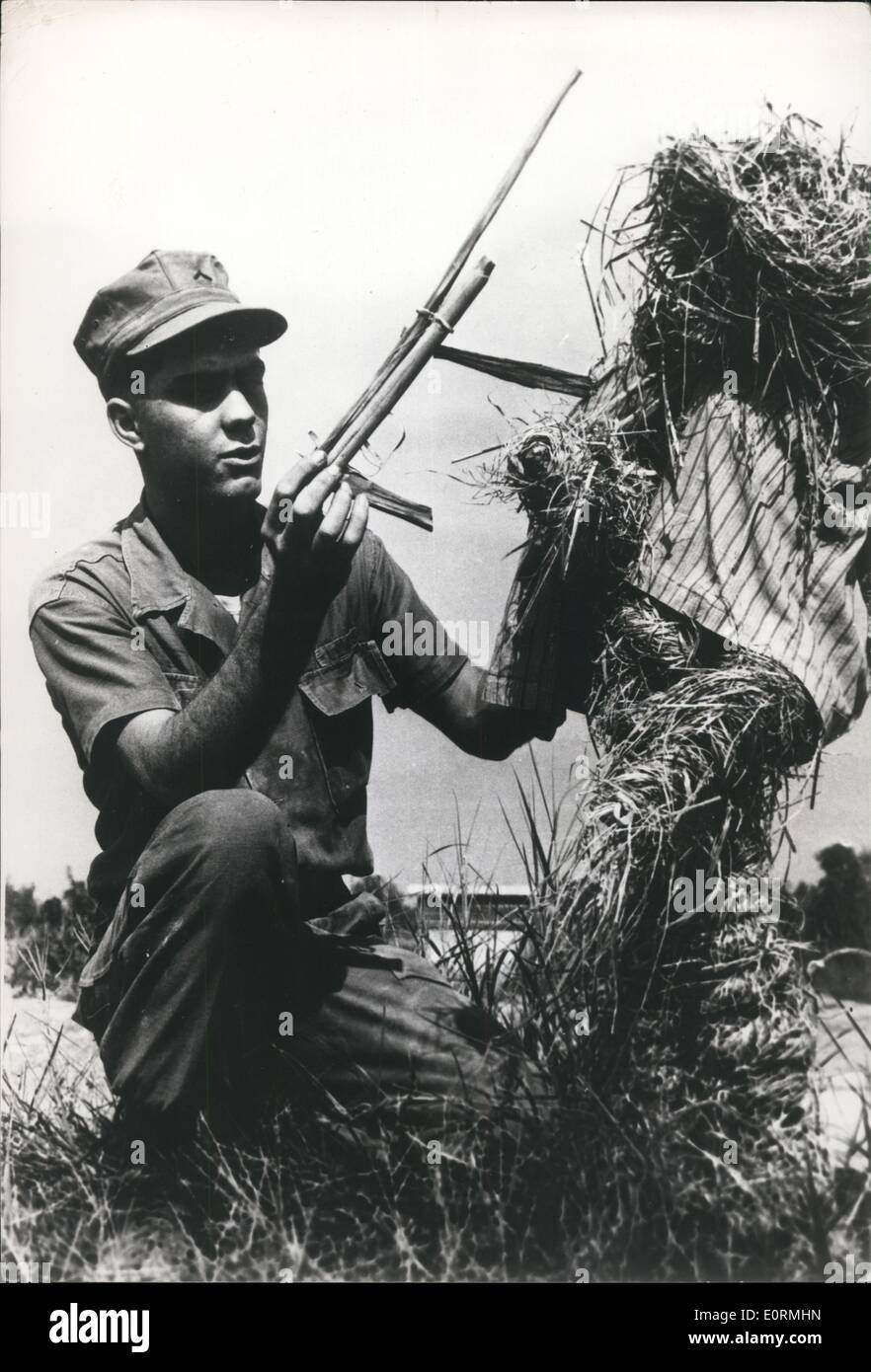 Jan 1, 1960 - Viet Cong Scarecrow: An American soldier ''captures'' a Viet Cong scare-crow complete with wooden ''gun'' near Highway 5 in Vietnam. The scarecrow is put up by the Viet cong to draw rifle fire, and reveal the position of their enemies. Stock Photo