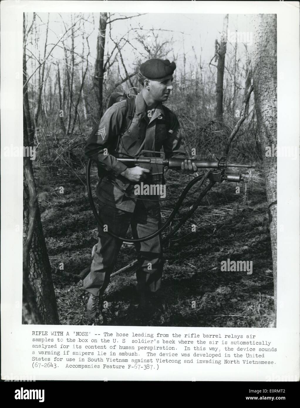 Jan 1, 1960 - Rifle with a Nose: The hose leading from the rifle barrel relays air samples to the box on the U.S. soldier's back where the air is automatically analyzed for its content of human perspiration. In this way the device sounds a warning if snipers lie in ambush. The device was developed in the United States for use in South Vietnam against Vietcong and invading North Vietnamese. Stock Photo