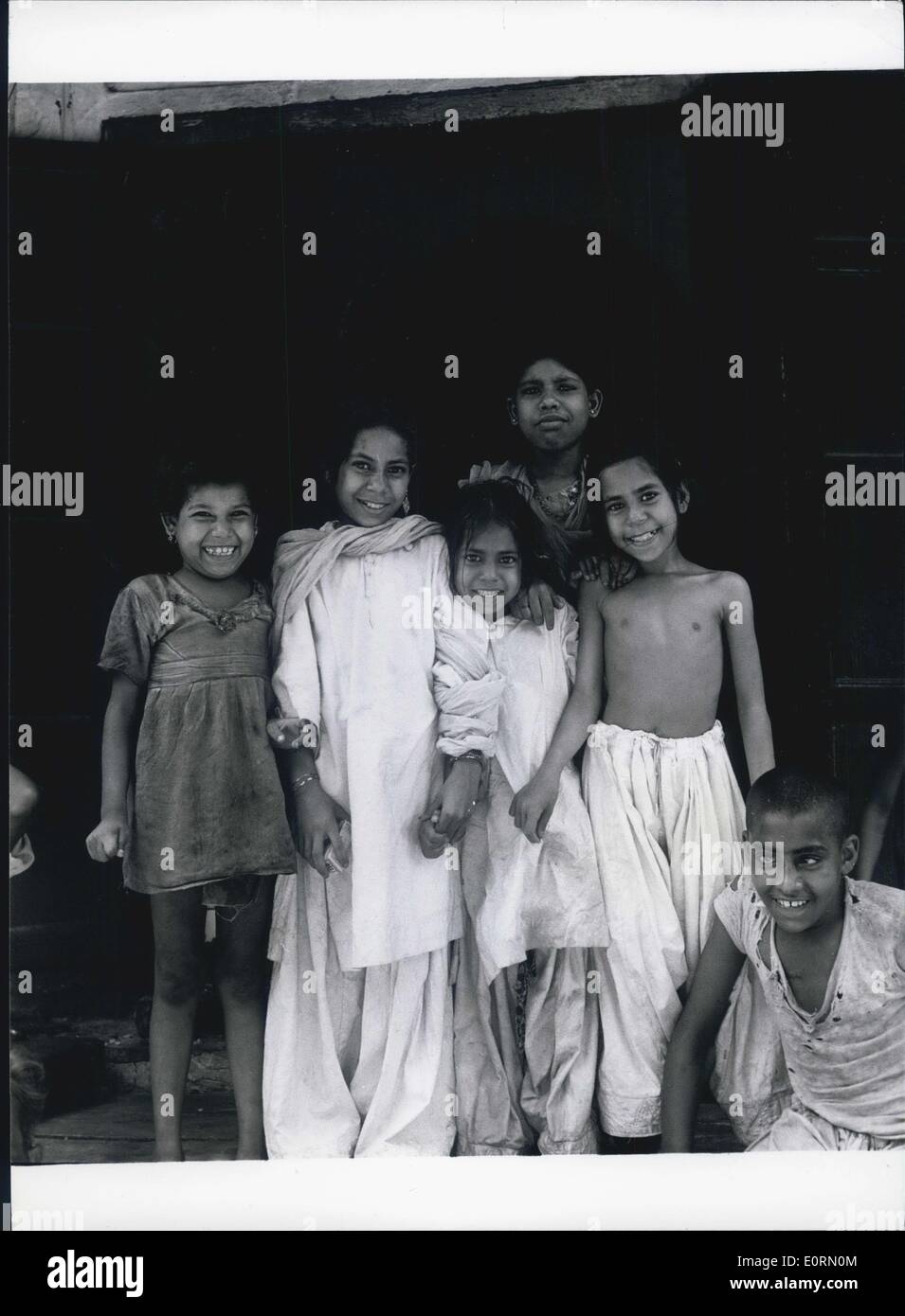 Jan. 01, 1960 - The Children of Old Delhi: Born and bred in narrow streets, children of poor Indian families, they can sill master a radiant smile for the photographer. (exact date unknown) Stock Photo