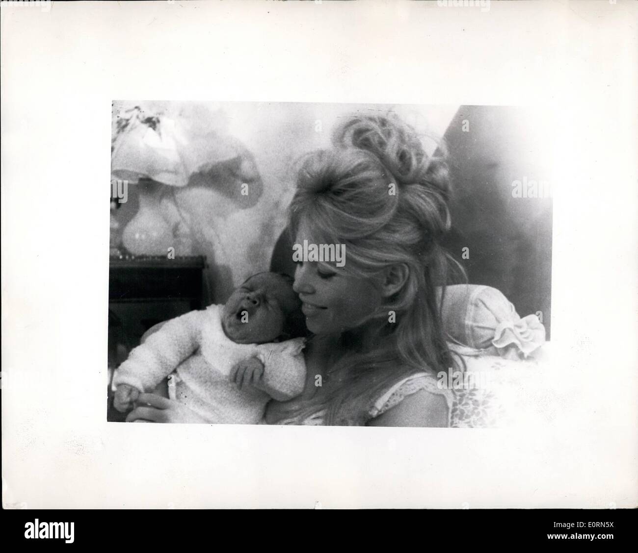 Jan. 13, 1960 - 13-1-60 Brigitte Bardot with her baby son. Keystone Photo  Shows: Pictured just received by wire from Paris, showing famous French  actress, Brigitte Bardot, with her husband Jacques Charrier,