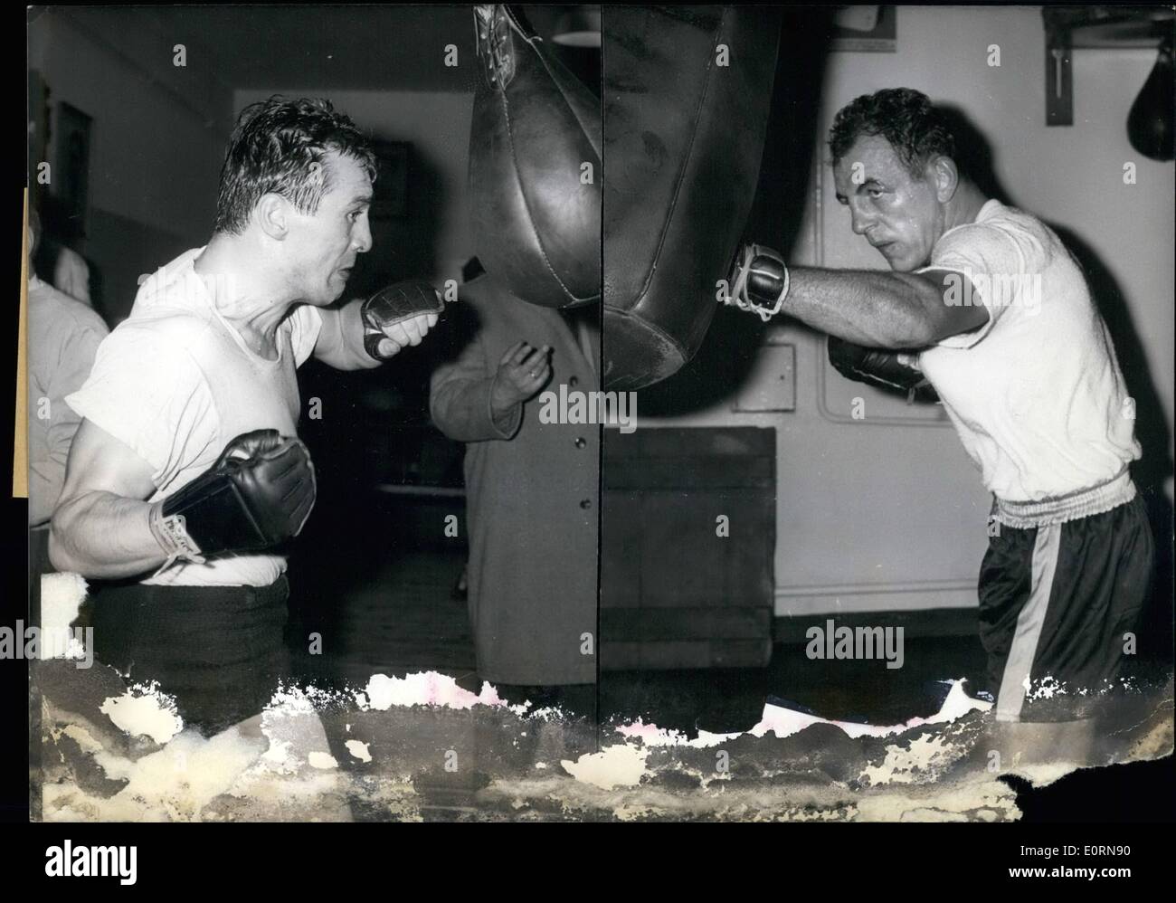 Mar. 03, 1960 - Training for the great fight was the programme on March 16th for the two main boxers of the fight on next week-end in Berlin. As known, Gustav ''Bubi'' Scholz (Gustav Scholz) and Mike Holt (Mike Holt) will fight on March 19th. Photo shows on left Bubi Sanchez and on right Mike Holt during their training in the sporting school in Berlin. Stock Photo