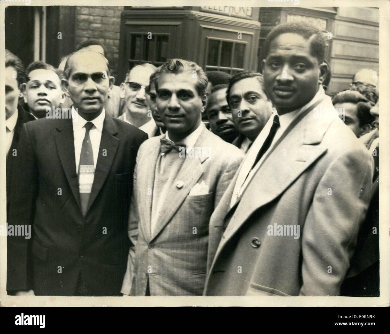 Mar. 03, 1960 - Dr. Jagan Goes To Bow-Street To Give Evidence: Dr. Cheddi Jagan, British Guiana's Minister for Trade and Industry, went to Bow Street today give evidence following the arrest yesterday of two of his colleagues on a delegation discussing constructional reforms with the Colonel Office. They are mr. Jai Narine Singh, 51 years old leader of the Genuineness Independent Movement, and Mr.Linden Forebes Samson Burnham: 37, leader of the Guinan People's National Congress. Photo Shows Mr. Cheddi Jagan (center), picture with Mr. Singh (left) and Mr. Burnham today. Stock Photo