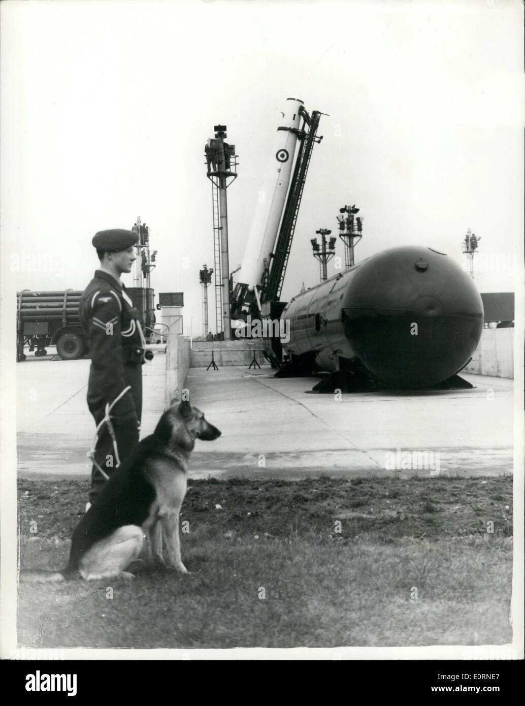 Feb. 02, 1960 - Press Visit to R.A.F. Feltwell - Thor Ballistic Missile Base. On the Launching Pad.: A press visit was made today to R.A.F. feltwell - Thor intermediate - range ballistic missile base. The thor is now able to take its places as part of the operational front - line of the Royal Air Force. Photo shows The rocket raised on the launching pad - showing in foreground - the Liquid Oxygen tanks which supply the fuel - at R.A.F. Feltwell today. Stock Photo